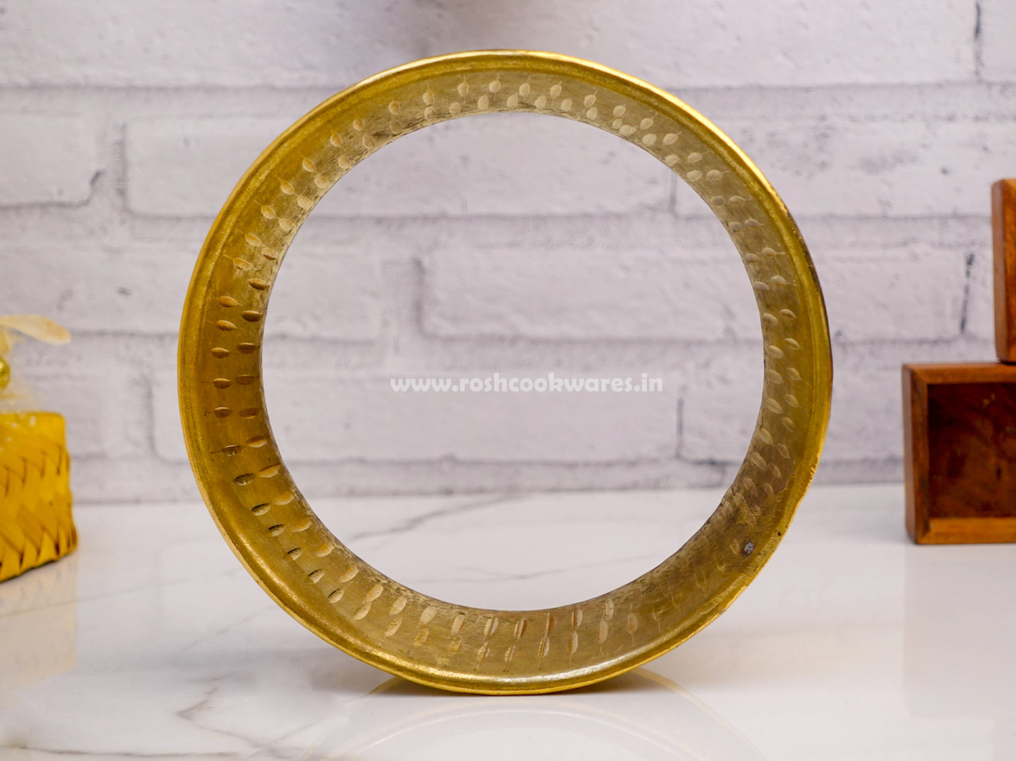 Brass Pirimanai round shape vessel stand for kitchen.